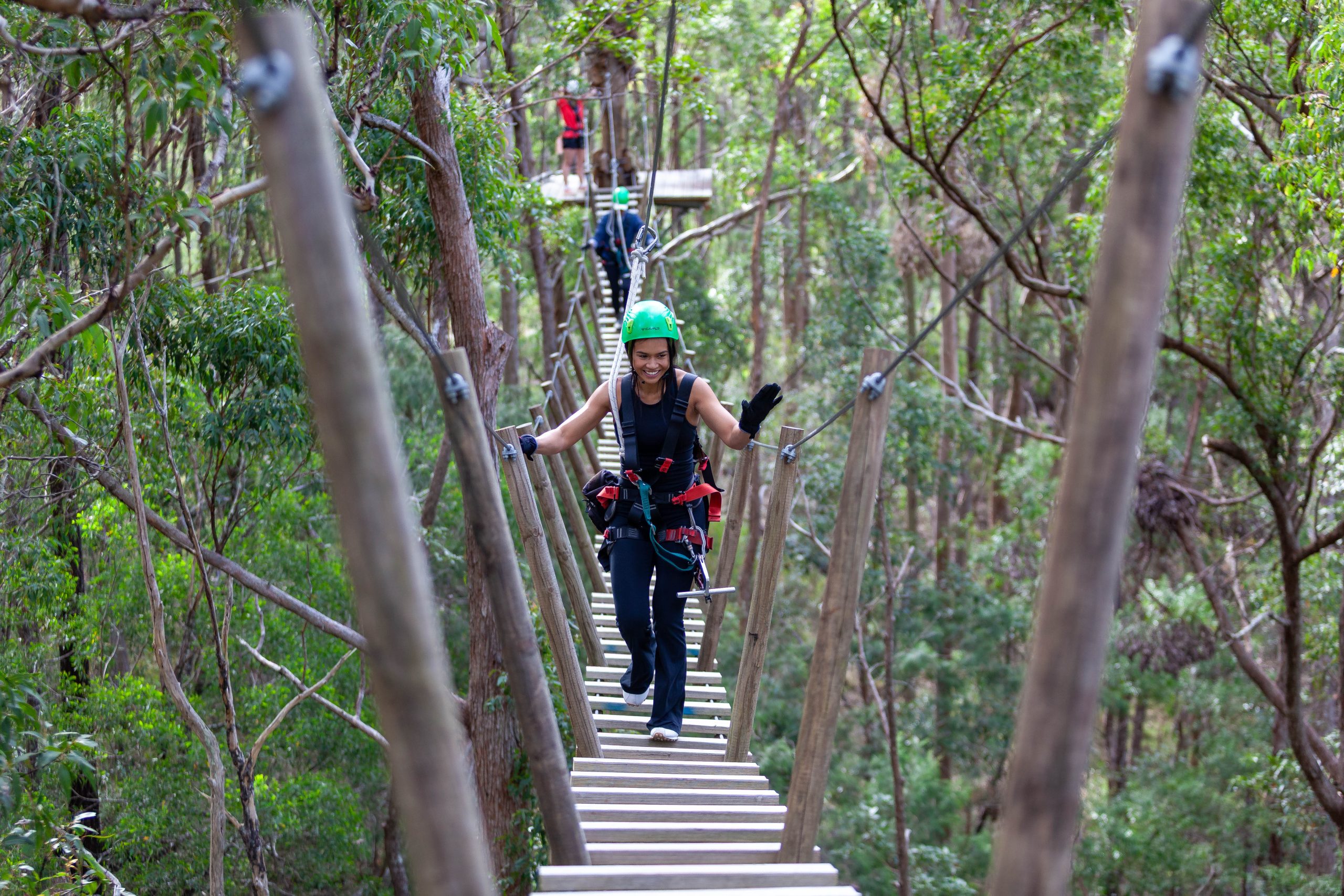 Guest soaring through the treetops at Thunderbird Park